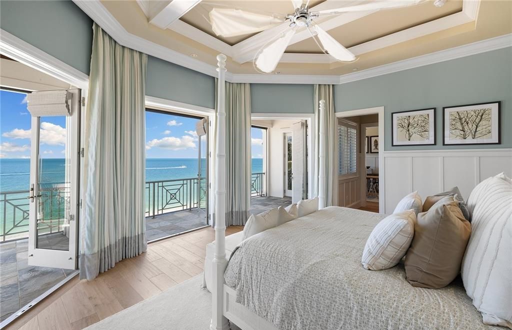 Immerse yourself in luxury living at this 7,490 sq ft beachfront estate. Custom-built with high-end finishes, this 4-bedroom home boasts a chef's kitchen, private pool, and expansive Gulf views. Perfect for entertaining, with private balconies and an open floor plan. Live the Barefoot Beach dream today!