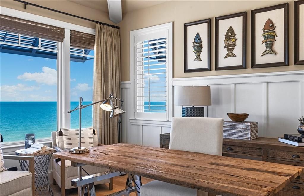 Immerse yourself in luxury living at this 7,490 sq ft beachfront estate. Custom-built with high-end finishes, this 4-bedroom home boasts a chef's kitchen, private pool, and expansive Gulf views. Perfect for entertaining, with private balconies and an open floor plan. Live the Barefoot Beach dream today!