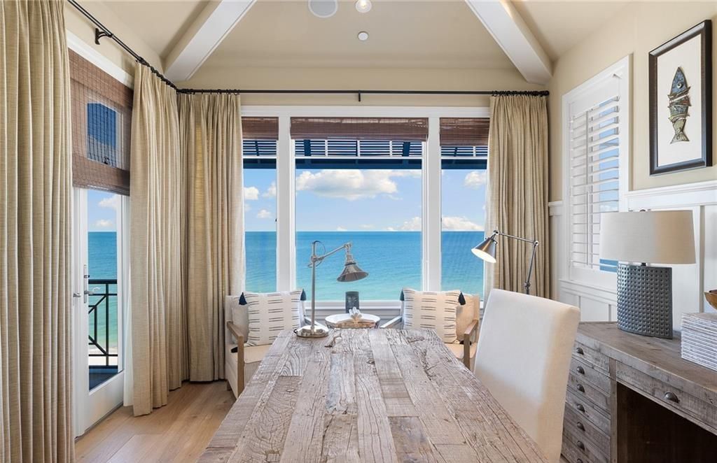 Immerse yourself in luxury living at this 7,490 sq ft beachfront estate. Custom-built with high-end finishes, this 4-bedroom home boasts a chef's kitchen, private pool, and expansive Gulf views. Perfect for entertaining, with private balconies and an open floor plan. Live the Barefoot Beach dream today!