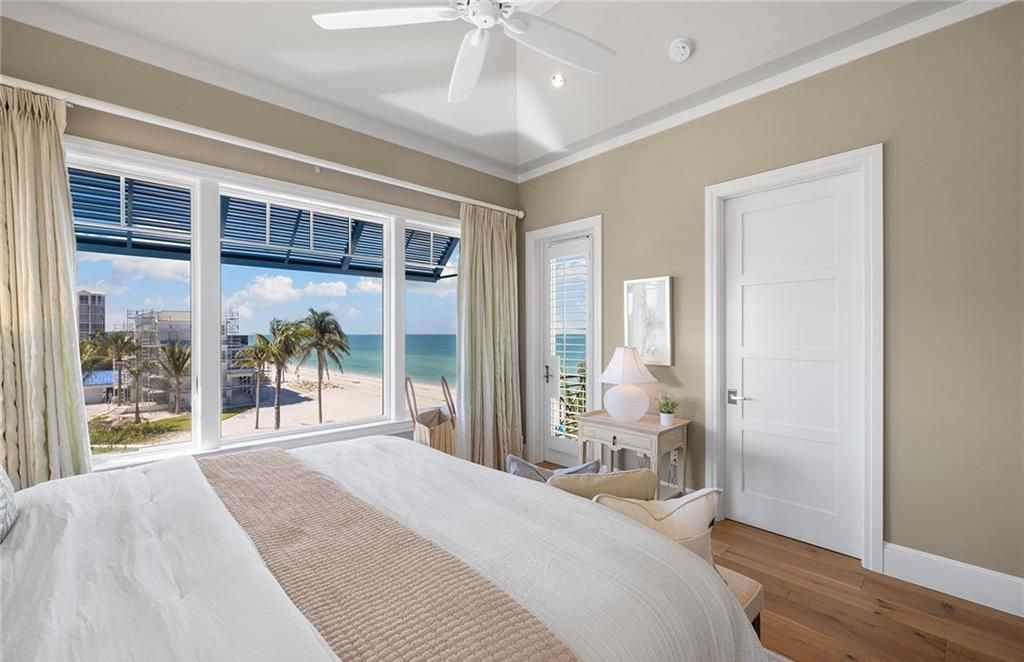 Immerse yourself in luxury living at this 7,490 sq ft beachfront estate. Custom-built with high-end finishes, this 4-bedroom home boasts a chef's kitchen, private pool, and expansive Gulf views. Perfect for entertaining, with private balconies and an open floor plan. Live the Barefoot Beach dream today!