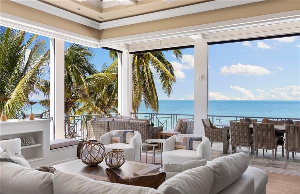 Immerse yourself in luxury living at this 7,490 sq ft beachfront estate. Custom-built with high-end finishes, this 4-bedroom home boasts a chef's kitchen, private pool, and expansive Gulf views. Perfect for entertaining, with private balconies and an open floor plan. Live the Barefoot Beach dream today!