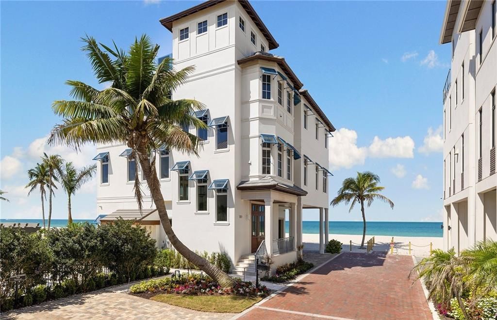 Immerse yourself in luxury living at this 7,490 sq ft beachfront estate. Custom-built with high-end finishes, this 4-bedroom home boasts a chef's kitchen, private pool, and expansive Gulf views. Perfect for entertaining, with private balconies and an open floor plan. Live the Barefoot Beach dream today!