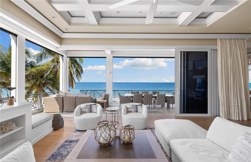 Immerse yourself in luxury living at this 7,490 sq ft beachfront estate. Custom-built with high-end finishes, this 4-bedroom home boasts a chef's kitchen, private pool, and expansive Gulf views. Perfect for entertaining, with private balconies and an open floor plan. Live the Barefoot Beach dream today!