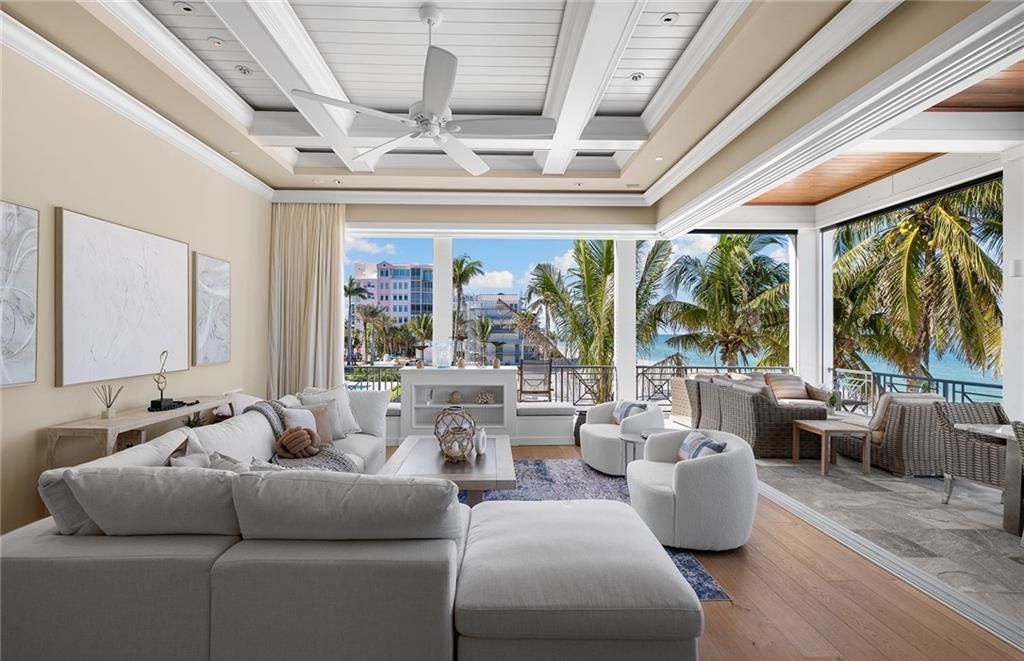 Immerse yourself in luxury living at this 7,490 sq ft beachfront estate. Custom-built with high-end finishes, this 4-bedroom home boasts a chef's kitchen, private pool, and expansive Gulf views. Perfect for entertaining, with private balconies and an open floor plan. Live the Barefoot Beach dream today!