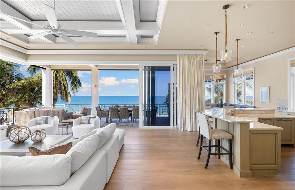 Immerse yourself in luxury living at this 7,490 sq ft beachfront estate. Custom-built with high-end finishes, this 4-bedroom home boasts a chef's kitchen, private pool, and expansive Gulf views. Perfect for entertaining, with private balconies and an open floor plan. Live the Barefoot Beach dream today!