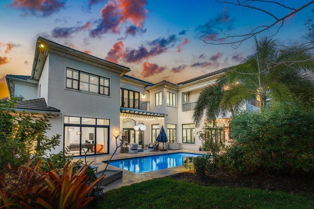 Indulge in luxury living at this sprawling 7,600 SF estate featured in Palm Beach Illustrated. Nestled in prestigious Kensington enclave, this home boasts a private backyard oasis with pool, summer kitchen, and lush landscaping. Residents enjoy world-class amenities in Seven Bridges!