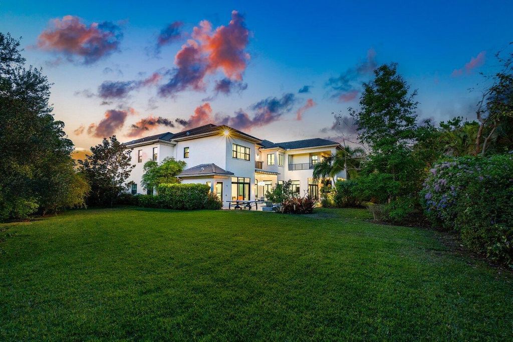 Indulge in luxury living at this sprawling 7,600 SF estate featured in Palm Beach Illustrated. Nestled in prestigious Kensington enclave, this home boasts a private backyard oasis with pool, summer kitchen, and lush landscaping. Residents enjoy world-class amenities in Seven Bridges!