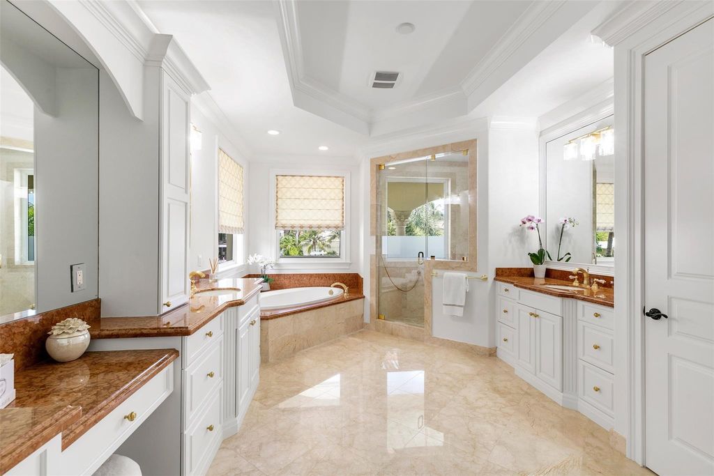 Discover opulence in this stunning 7 bed/7.5 bath Harbor Beach estate. Enjoy breathtaking water views, a gourmet kitchen, luxurious amenities, and quick ocean access. Experience the epitome of waterfront living with this meticulously maintained home, just minutes from the beach and Fort Lauderdale airport.