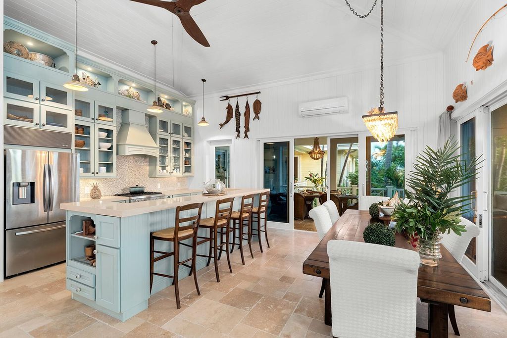 Seeking a one-of-a-kind escape? Howell Key, a turnkey 9.69-acre island paradise, awaits! This off-grid oasis boasts a 5-bedroom immaculate home, saltwater pool, guest house, helipad. Direct ocean access, proximity to Looe Key Sanctuary, and a second ROGO-exempt permit for your dream home make this the ultimate investment opportunity. Live your island dream or create an unforgettable vacation rental experience.