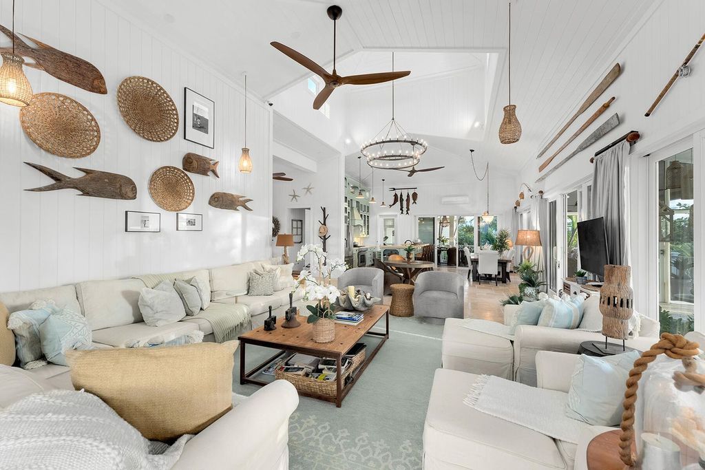 Seeking a one-of-a-kind escape? Howell Key, a turnkey 9.69-acre island paradise, awaits! This off-grid oasis boasts a 5-bedroom immaculate home, saltwater pool, guest house, helipad. Direct ocean access, proximity to Looe Key Sanctuary, and a second ROGO-exempt permit for your dream home make this the ultimate investment opportunity. Live your island dream or create an unforgettable vacation rental experience.