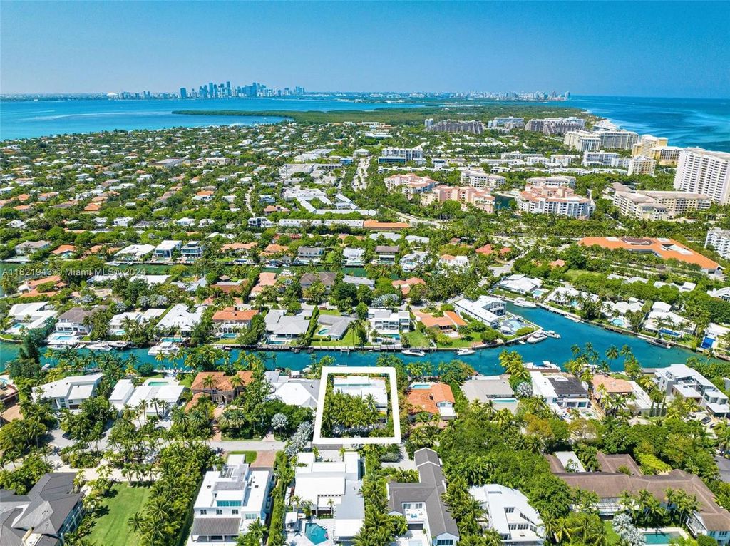 Immerse yourself in unparalleled luxury living in this stunning, completely renovated Key Biscayne waterfront home. Indulge in breathtaking canal views, a contemporary design, a private oasis, and top-of-the-line amenities, including a gym, home theater, summer kitchen, and boat lift. This 4-bedroom (easily convertible to 5) estate offers the ultimate in waterfront living.