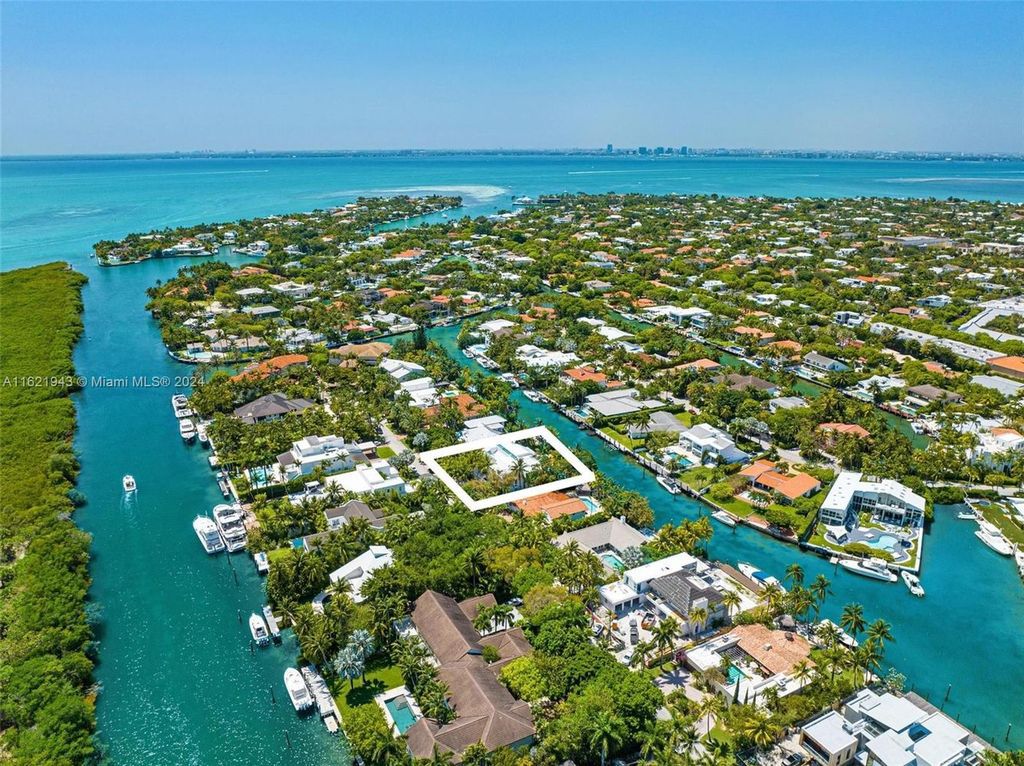 Immerse yourself in unparalleled luxury living in this stunning, completely renovated Key Biscayne waterfront home. Indulge in breathtaking canal views, a contemporary design, a private oasis, and top-of-the-line amenities, including a gym, home theater, summer kitchen, and boat lift. This 4-bedroom (easily convertible to 5) estate offers the ultimate in waterfront living.