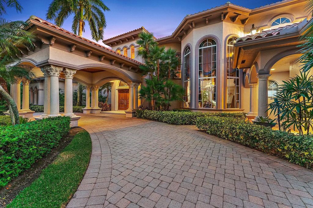 Own the Premier Estate in Ibis! Palatial 5BR Home with Pool, Lakefront and Golf Course Views. Exquisite Details, Chef's Kitchen, Billiard Room, Theater and More in Desirable Gated Community.