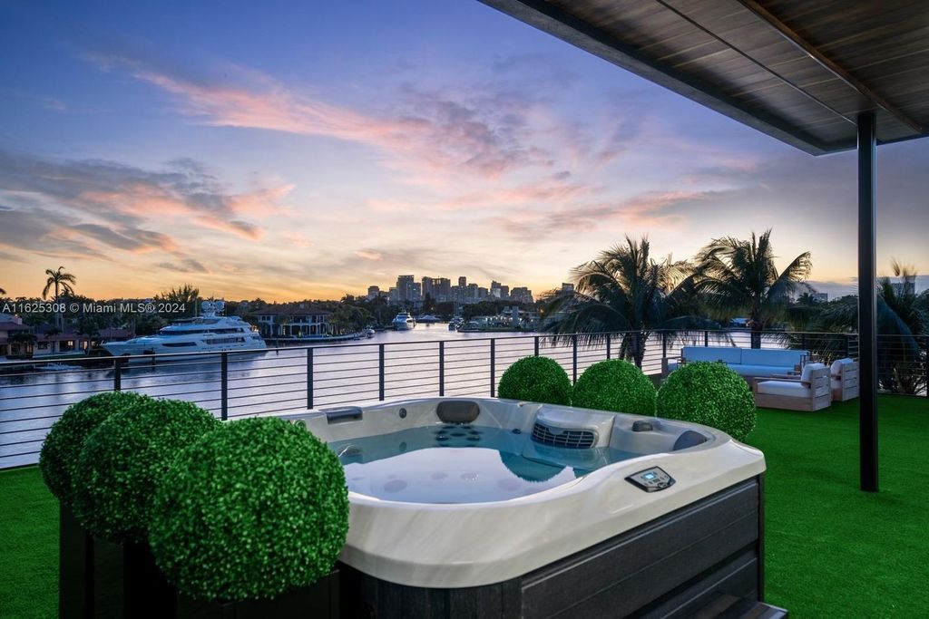 Live the ultimate Fort Lauderdale lifestyle in this 11,000+ square feet waterfront mansion by Dov Stark. Featuring deep water frontage, 5 beds, 11 baths, theater, gym, and more!