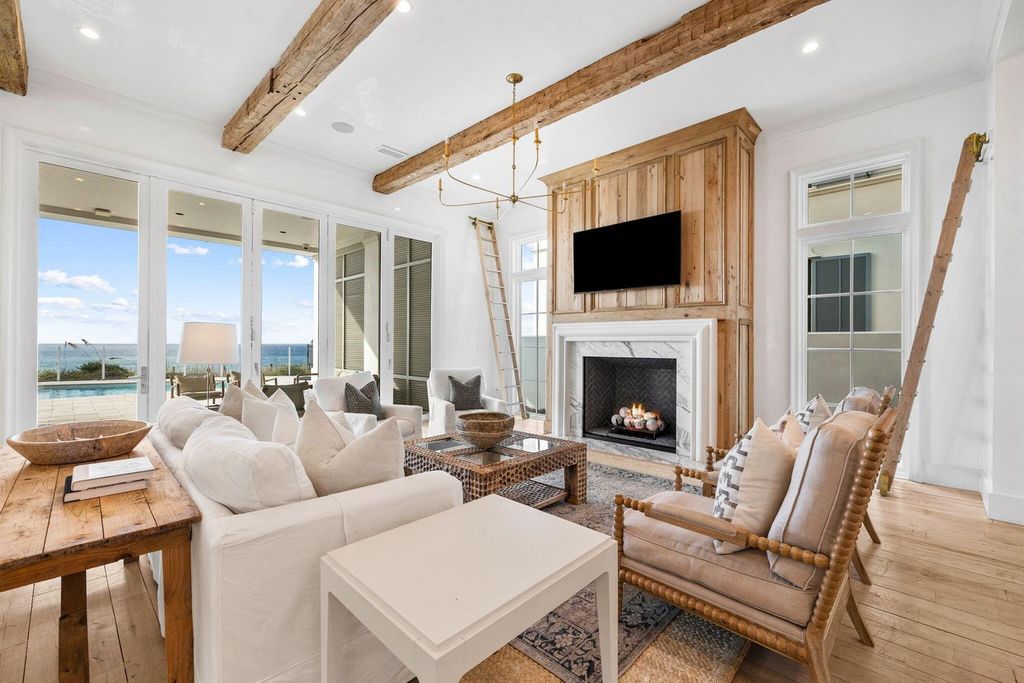 Unwind in beachfront bliss at this stunning 8-bedroom residence in Inlet Beach. Enjoy breathtaking ocean views, a private pool, gourmet kitchen, and multiple terraces. Perfect for family gatherings and unforgettable vacations!