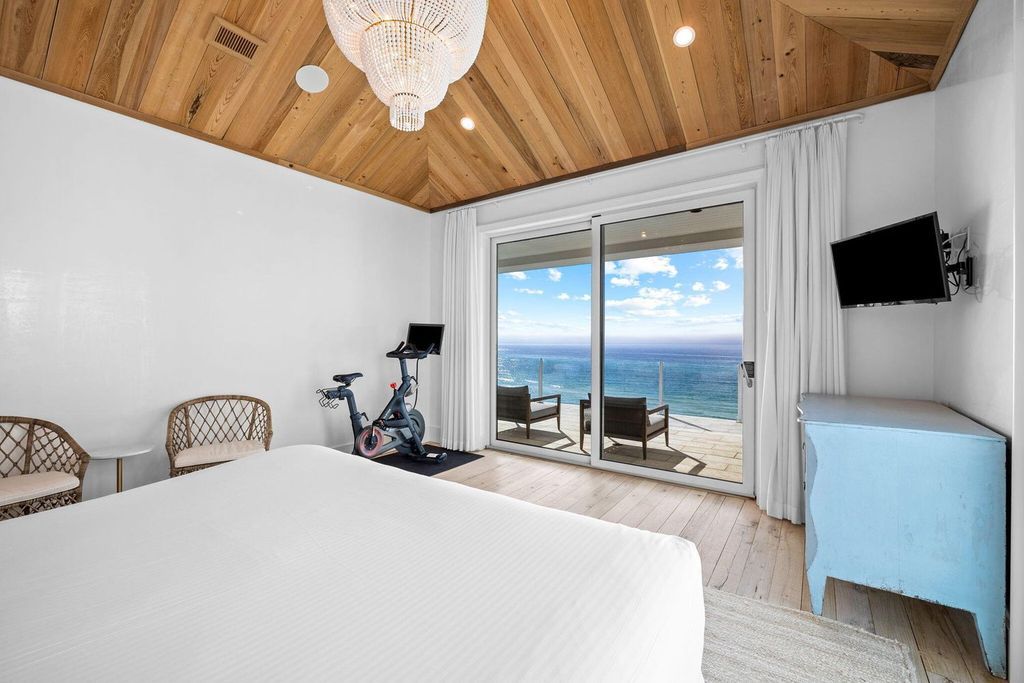 Unwind in beachfront bliss at this stunning 8-bedroom residence in Inlet Beach. Enjoy breathtaking ocean views, a private pool, gourmet kitchen, and multiple terraces. Perfect for family gatherings and unforgettable vacations!