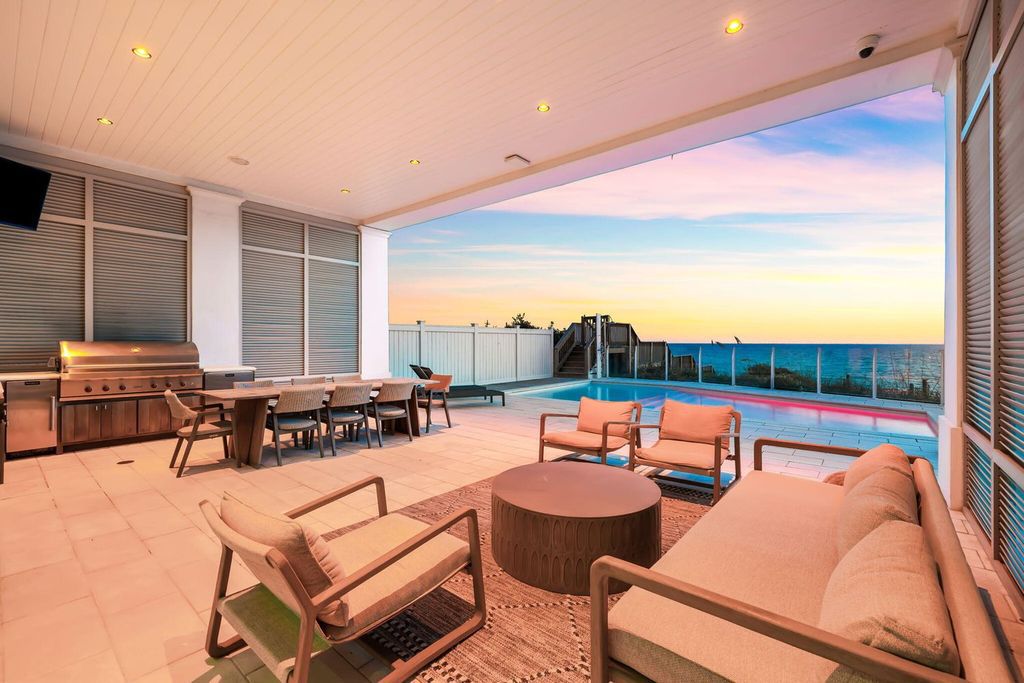 Unwind in beachfront bliss at this stunning 8-bedroom residence in Inlet Beach. Enjoy breathtaking ocean views, a private pool, gourmet kitchen, and multiple terraces. Perfect for family gatherings and unforgettable vacations!