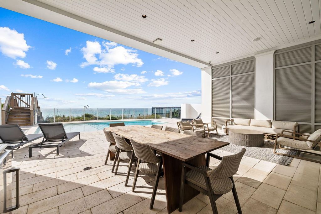 Unwind in beachfront bliss at this stunning 8-bedroom residence in Inlet Beach. Enjoy breathtaking ocean views, a private pool, gourmet kitchen, and multiple terraces. Perfect for family gatherings and unforgettable vacations!