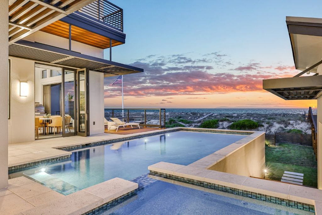 Immerse yourself in unparalleled luxury at this beachfront masterpiece on Amelia Island. This 6 bed, 8 bath custom estate boasts John Cotner design, commercial-grade construction, chef's kitchen, infinity pool and spa, and private guest house. Experience the epitome of coastal living.