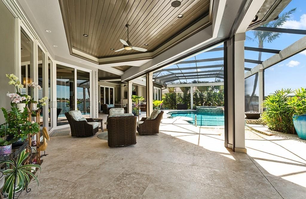 Never-before-listed masterpiece! This 7,100+ square feet estate boasts waterfront views, infinity pool, gourmet kitchen, and more! Perfect for entertaining with multiple living areas and a bonus room. Must-see in South Florida!