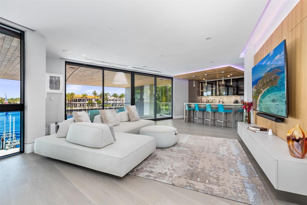 New! Live the dream in this 3-story masterpiece. Soaring ceilings, chef's kitchen, infinity pool, and private dock on the Intracoastal in exclusive Sea Ranch Lakes. Don't miss out!