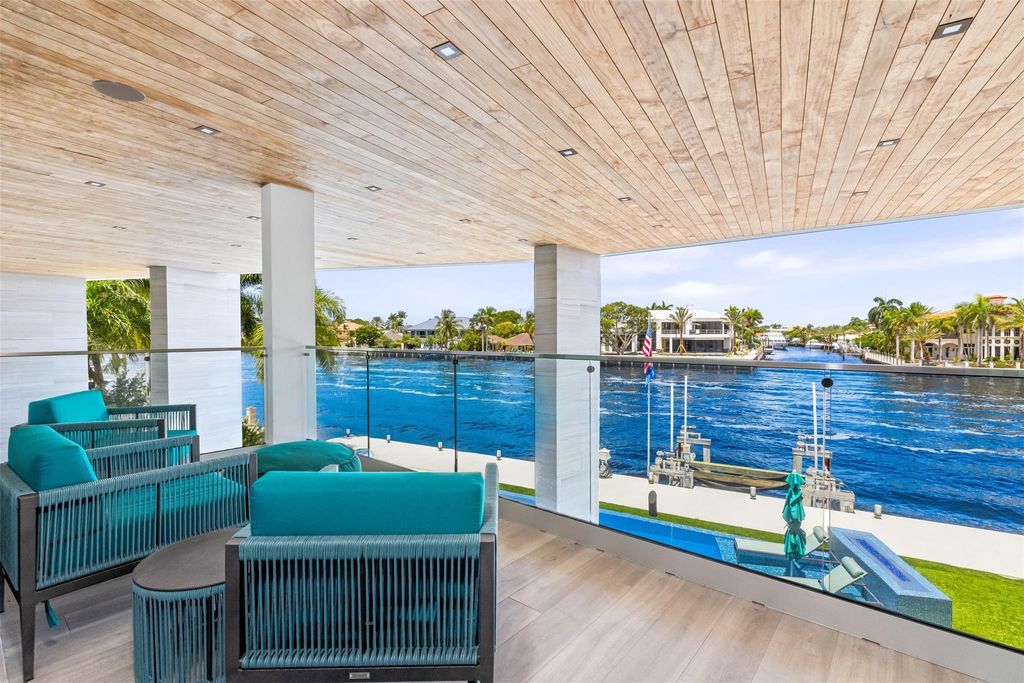 New! Live the dream in this 3-story masterpiece. Soaring ceilings, chef's kitchen, infinity pool, and private dock on the Intracoastal in exclusive Sea Ranch Lakes. Don't miss out!