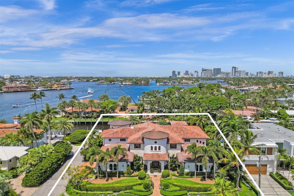 Wake up to stunning water views in this Fort Lauderdale dream home! This 6-bedroom estate offers an infinity pool, dock, and direct ocean access. Live the Florida dream!