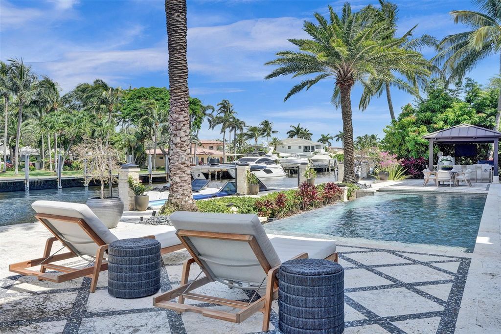 Wake up to stunning water views in this Fort Lauderdale dream home! This 6-bedroom estate offers an infinity pool, dock, and direct ocean access. Live the Florida dream!