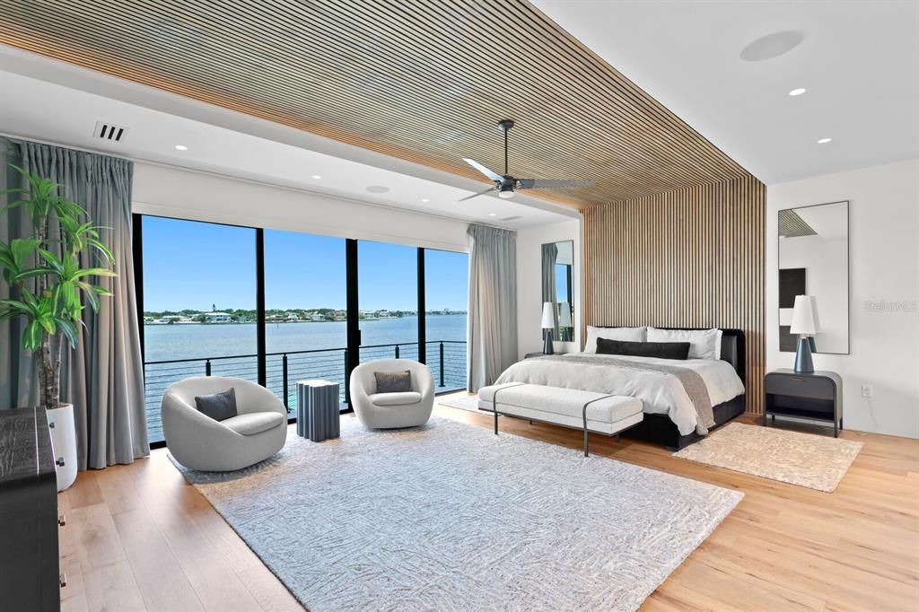 Rarely available NEW CONSTRUCTION! Live the dream in this 6-bedroom, 5.5-bath bayfront masterpiece. Sweeping water views, infinity pool, custom finishes, movie theater, wine cellar, and more in a sought-after school district. Available furnished.